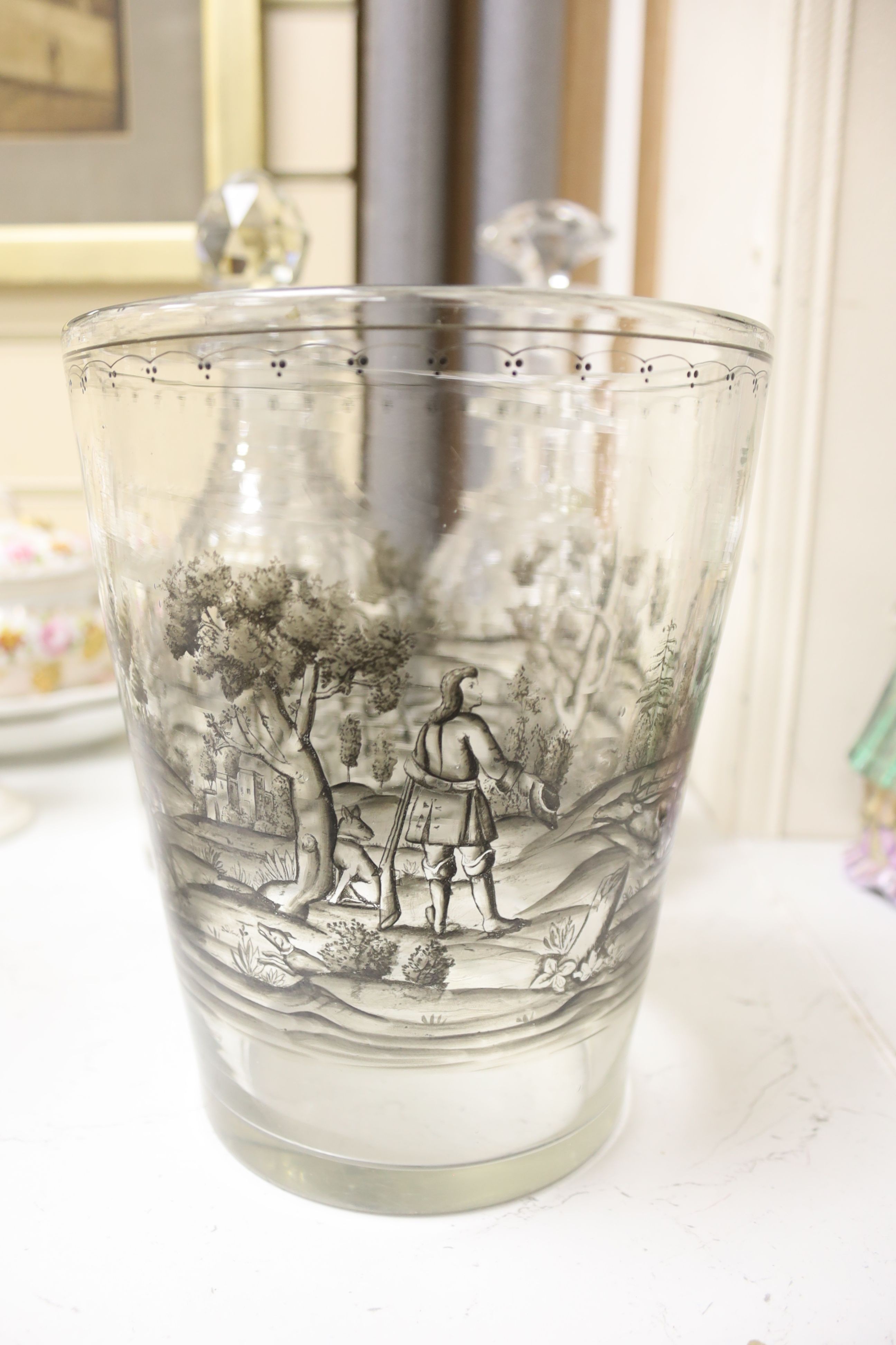 A glass vase with enamelled hunting scene with sundry decanters